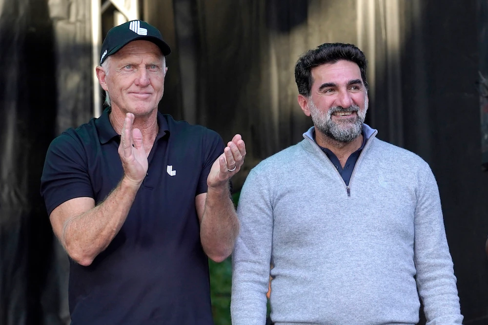 LIV Golf CEO Greg Norman, left, with Yasir Al-Rumayyan, governor of Public Investment Fund of Saudi Arabia, at the LIV Golf Invitational-Chicago tournament on Sept. 18, 2022 in Sugar Hill, Ill. (AP file photo)