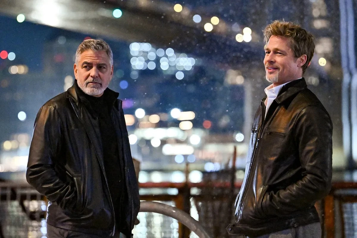 George Clooney and Brad Pitt star in ‘Wolfs.’ (Supplied)