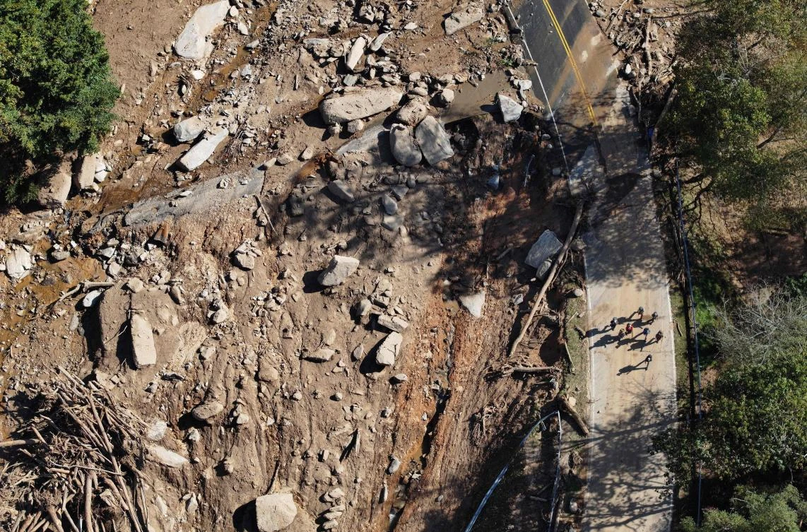 With at least 215 dead, lack of phone service and electricity continues to hinder efforts to contact the unaccounted for. (GETTY)