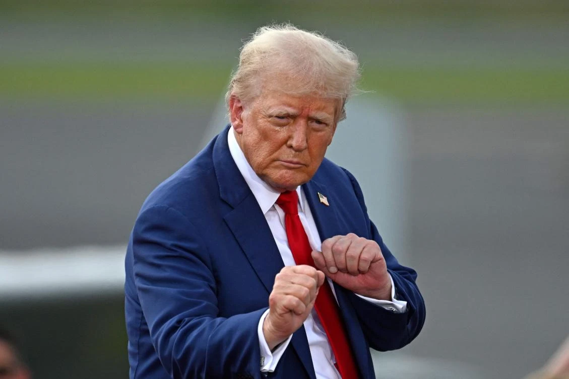 The former president’s visit to Fayetteville, home to a large military community, comes as the state has been convulsed by literal and political storms. (AFP)
