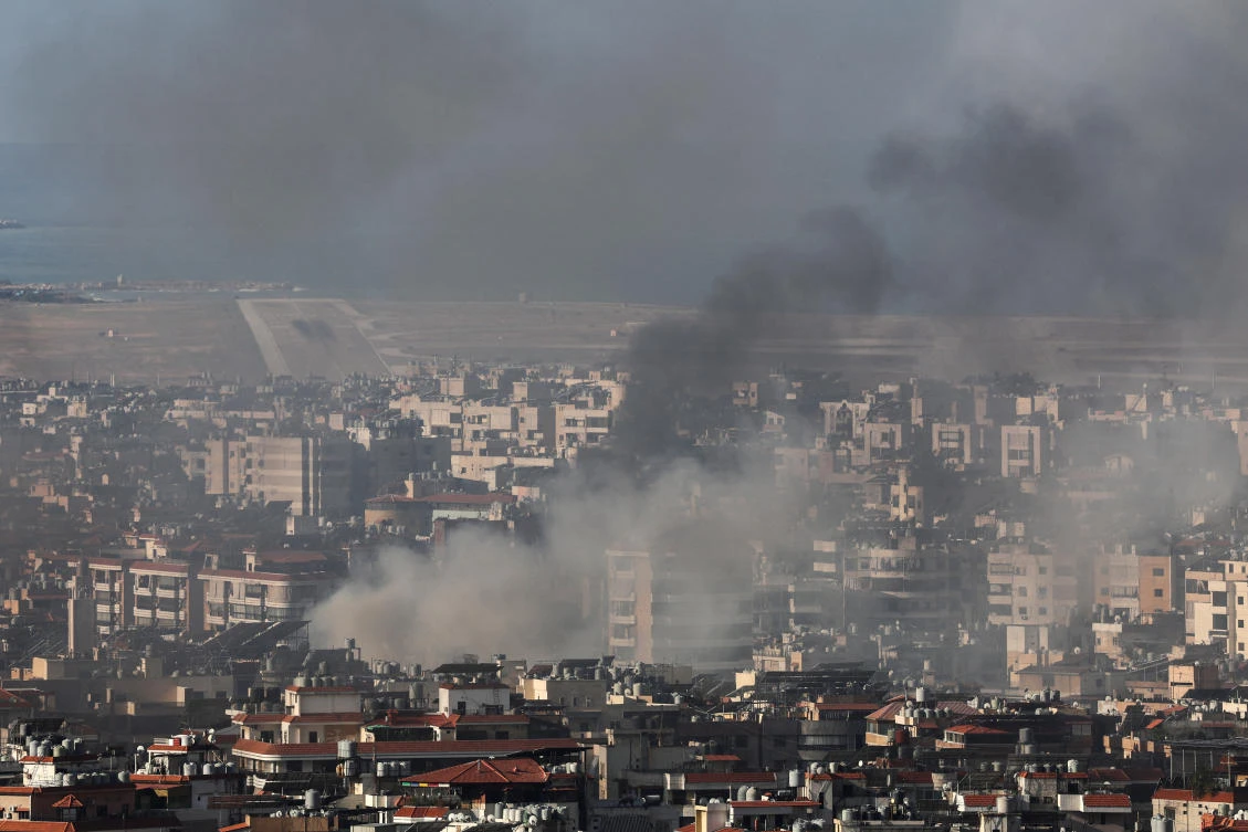 Above, smoke blankets the sky over the runway of Beirut-Rafic Hariri International Airport and Beirut’s southern suburbs after a strike on Oct. 2, 2024. (Reuters)