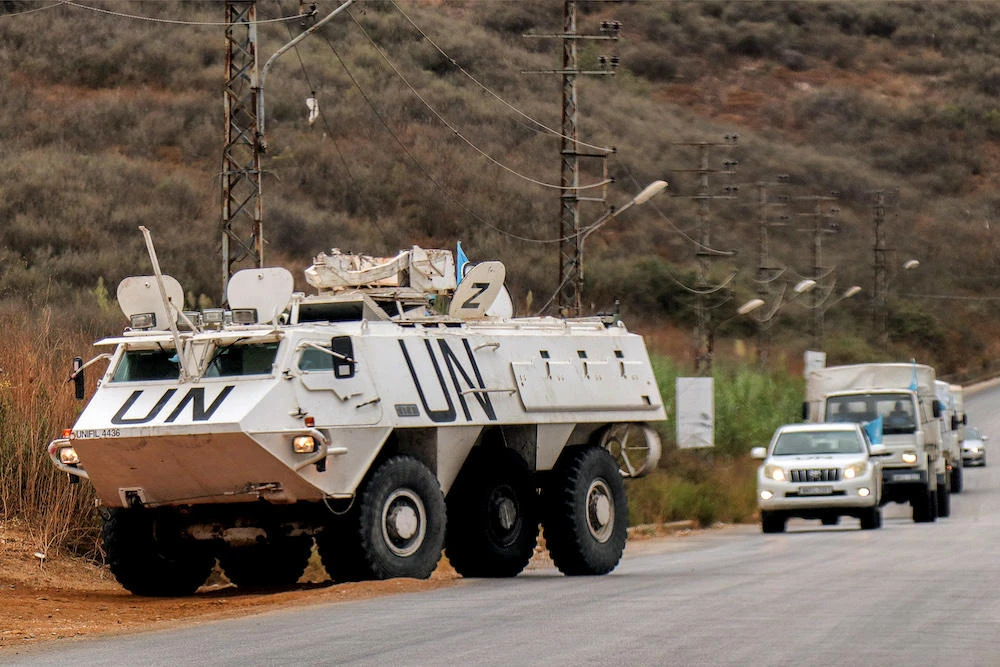 Above, an armored personnel carrier of the United Nations Interim Force in Lebanon patrols along Al-Khardali road in south Lebanon on Sept. 17, 2024. (AFP)