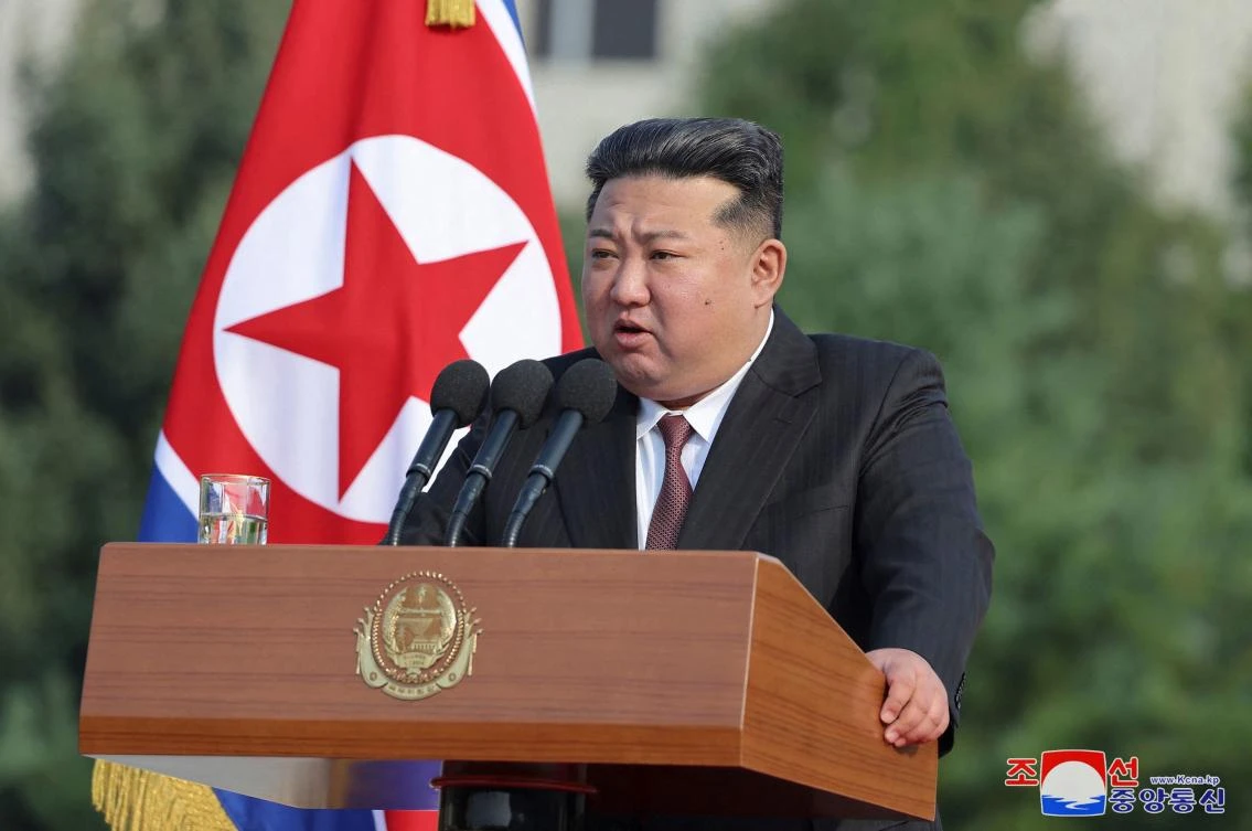 North Korean leader Kim Jong Un said that ‘if the enemies try to use force against our country, the Republic’s military will use all offensive power without hesitation.’ (KCNA via KNS/AFP)