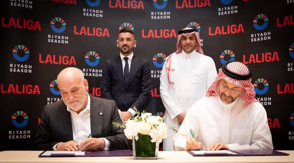 Javier Tebas and Faisal Bafarat sign the sponsorship agreement. (Supplied)