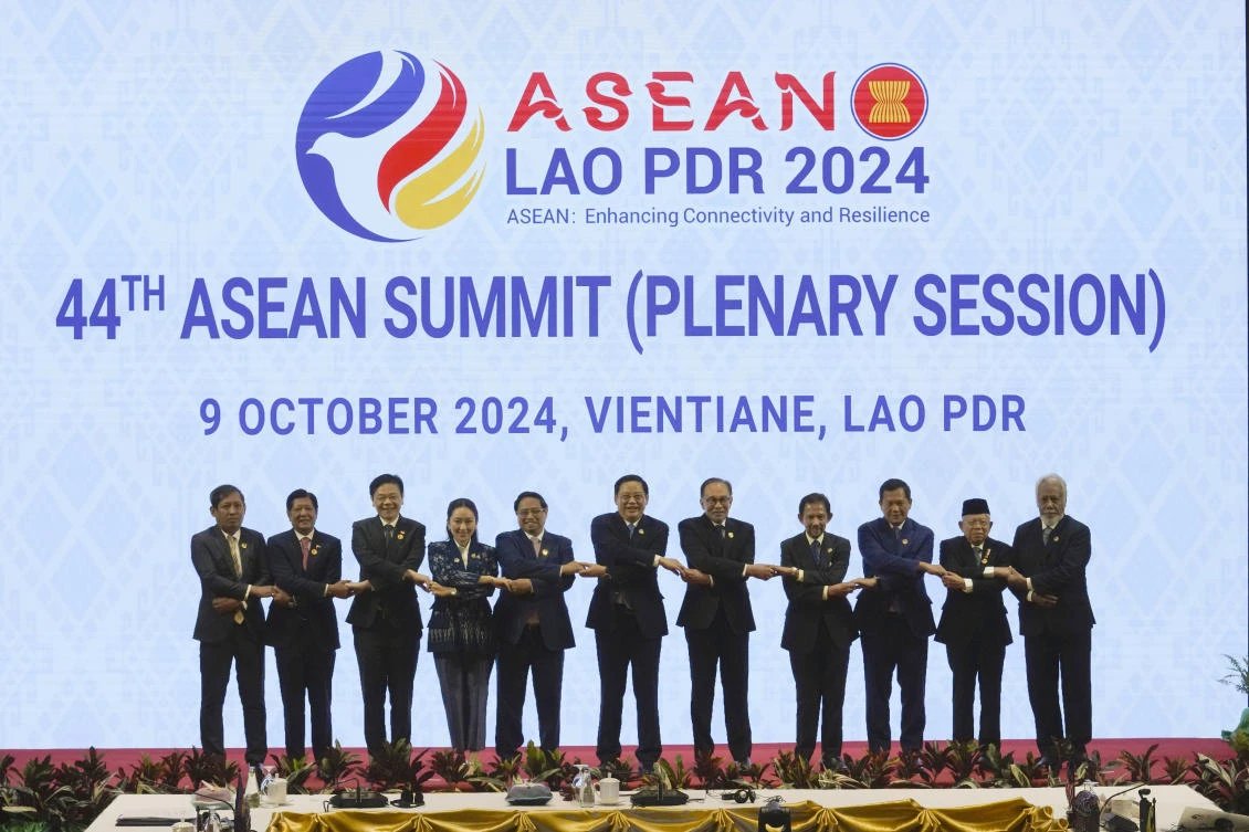 ASEAN leaders hold hands during the opening ceremony of the Association of Southeast Asian Nations 44th Summit in Vientiane, Laos on Oct. 9, 2024. (AP)