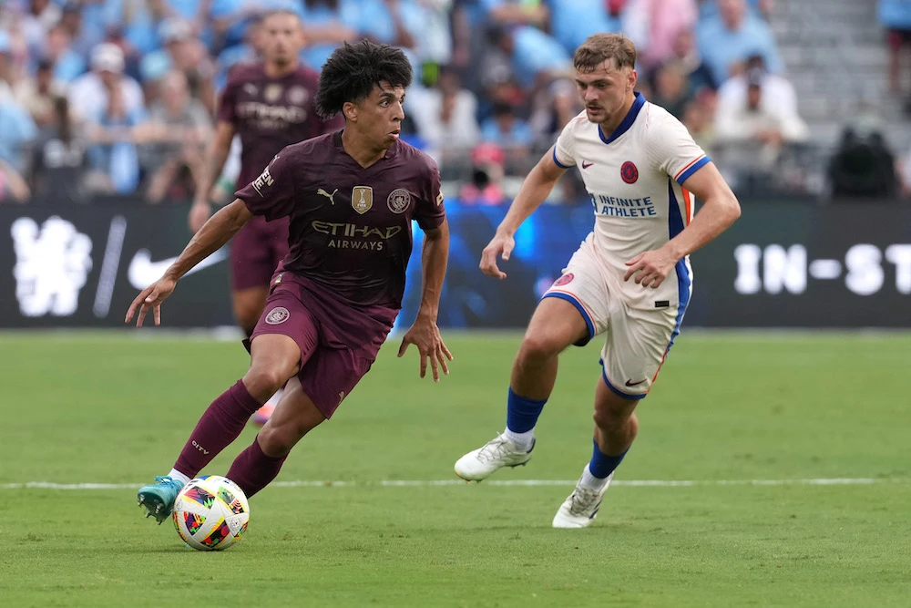 Rico Lewis of Manchester City controls the ball against Kiernan Dewsbury-Hall of Chelsea during a pre-season friendly at Ohio Stadium on Aug. 03, 2024 in Columbus, Ohio. (Getty Images via AFP)