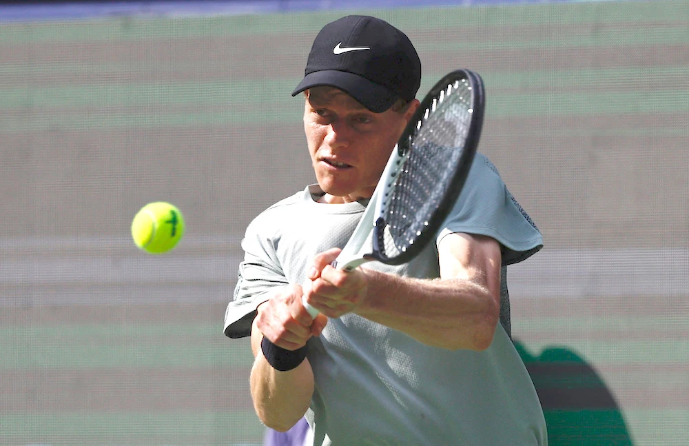 World number one Jannik Sinner looked confident from the start as he won in 88 minutes against American Ben Shelton 6-4, 7-6 (7/1). (Reuters)