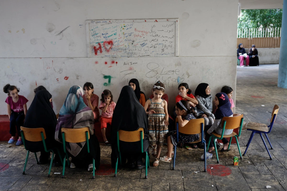 The UN estimates that more than 400,000 children have been displaced by the conflict to date and there are no formal schooling available in shelters. (Reuters photo)