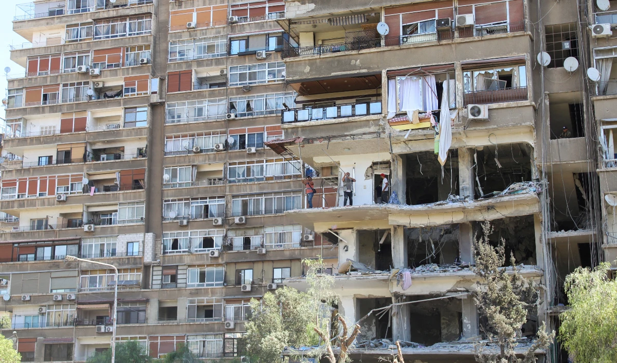 A view shows a damaged building in the aftermath of what Syrian state media reported was an Israeli strike in the Mezzah suburb, west of the Syrian capital Damascus, October 9, 2024. (Reuters/File)