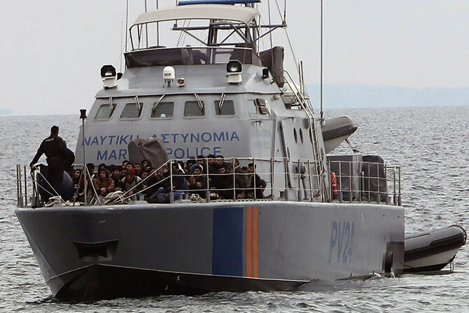 Migrants aboard a Cyprus marine police patrol boat are brought to a harbor after being rescued from their own vessel off the Mediterranean island nation’s southeastern coast of Protaras, Cyprus. (AP/File Photo)