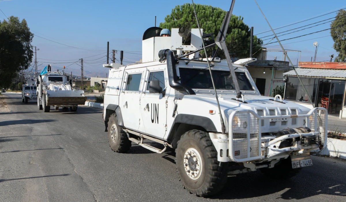 UNIFIL vehicles drive in Marjayoun, near the border with Israel. (Reuters)