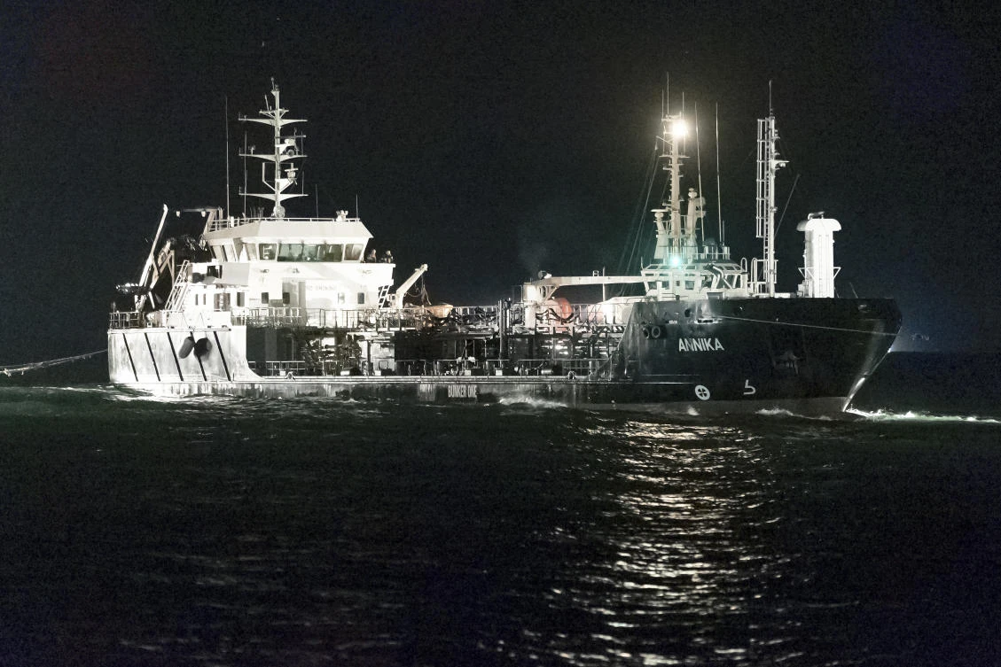 The oil tanker Annika, which was wrecked in the Baltic Sea after a fire, is towed to Rostock, Germany on Oct. 12, 2024. (dpa via AP)