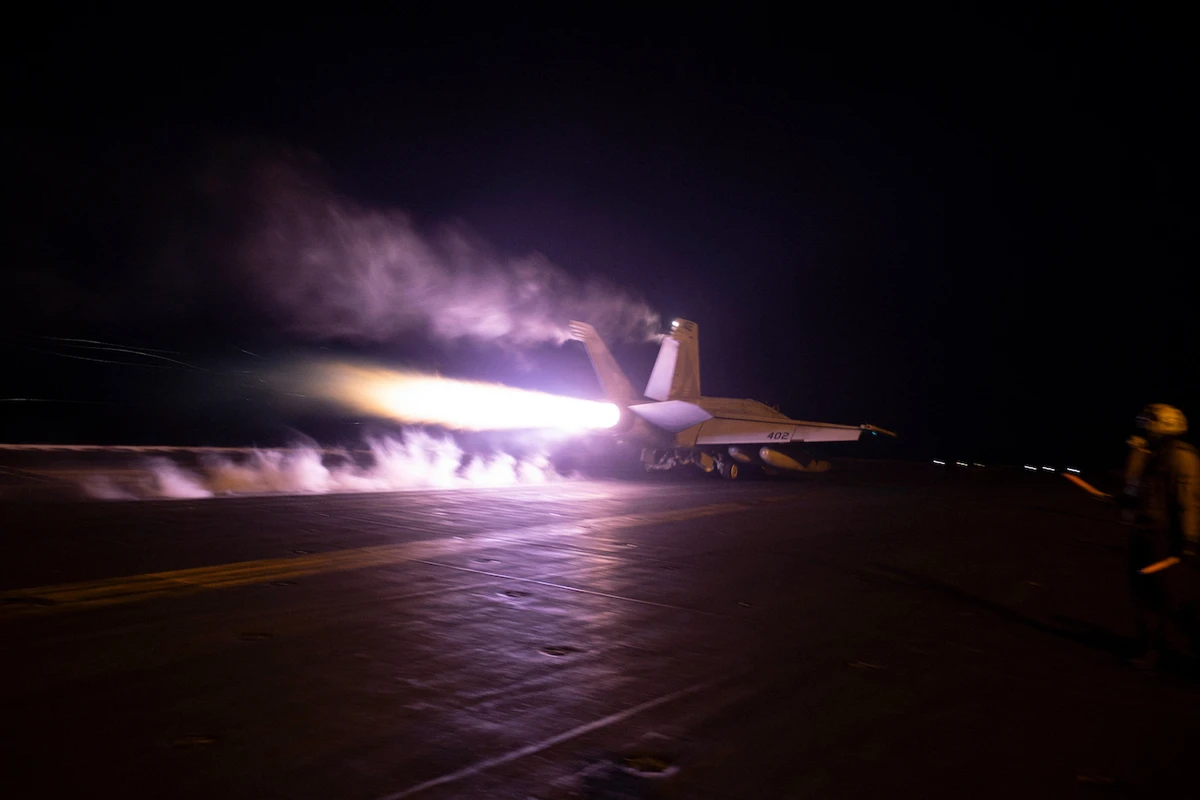 US Central Command forces, alongside UK Armed Forces, conduct strikes on Houthi targets in militia-controlled areas of Yemen. (File/AFP)