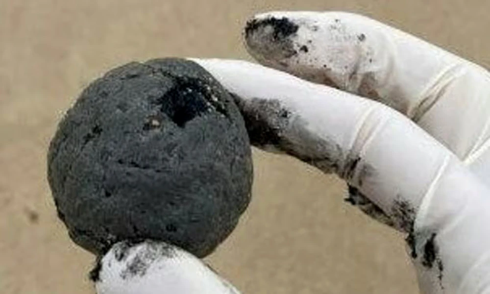 ‘Mysterious black balls’ close Sydney beach