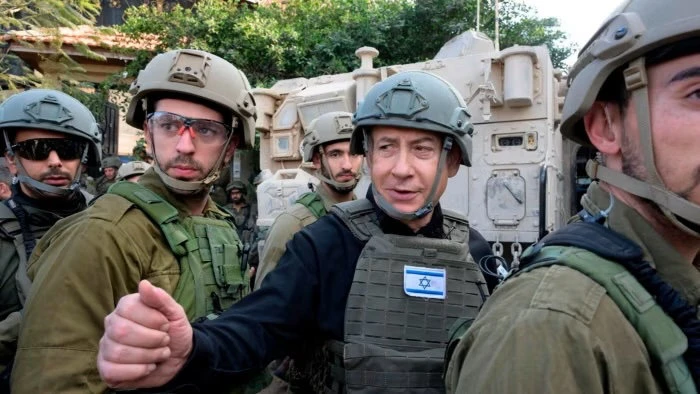 Benjamin Netanyahu, center, on a visit to the northern Gaza Strip. (AP/File)