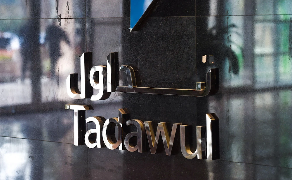 A picture shows the sign showing the name of the Saudi Stock Exchange (Tadawul) outside the exchange building. File/AFP