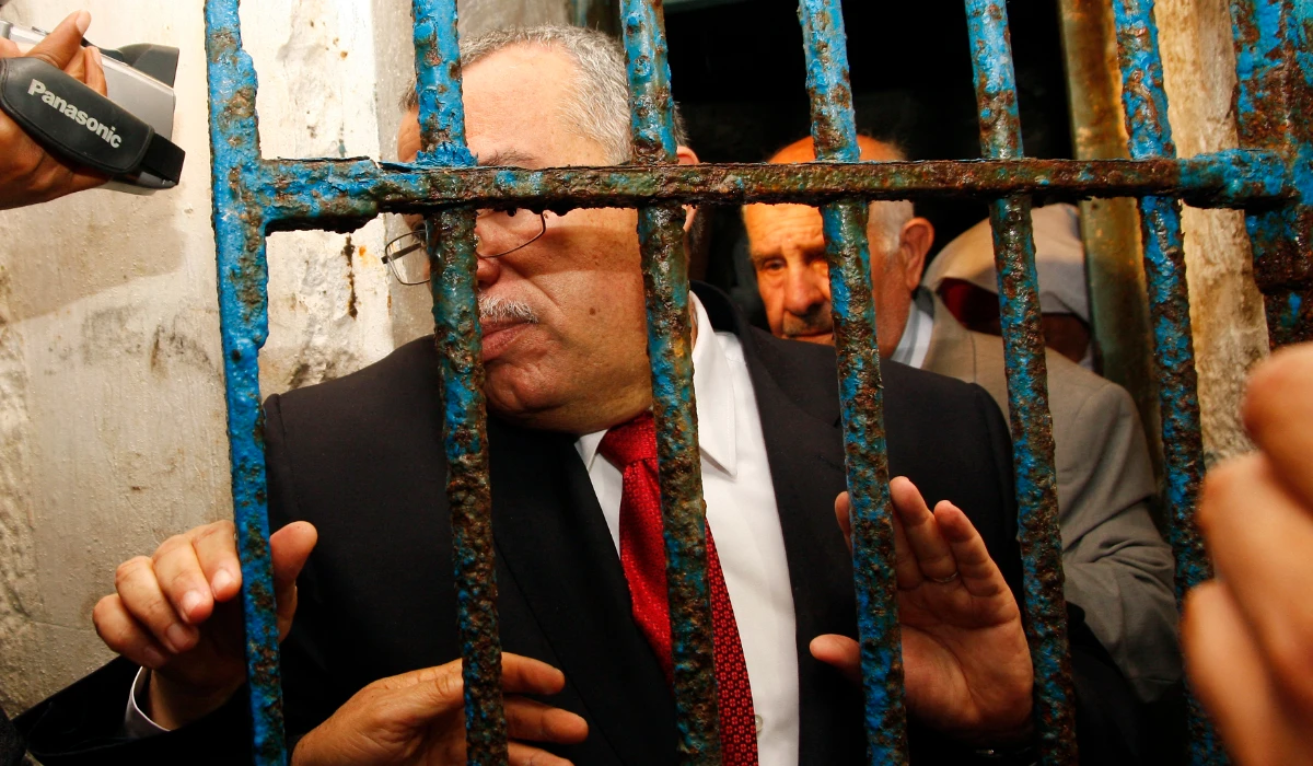 Tunisian Minister of Justice Noureddine Bhiri (C) visits the notorious prison of Ennadhour on April 29, 2012, in Bizerte. (AFP file photo)