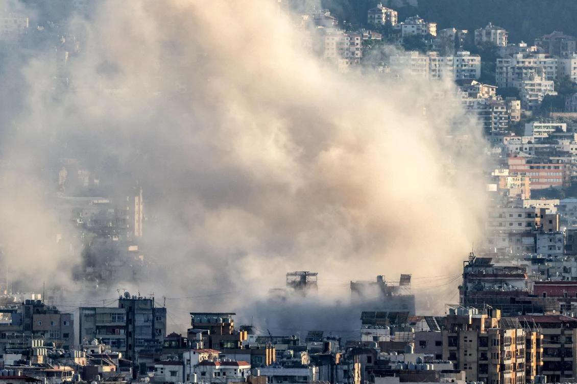 A cloud of smoke erupts following an Israeli airstrike on Beirut’s southern suburbs on Oct. 19, 2024. (AFP)