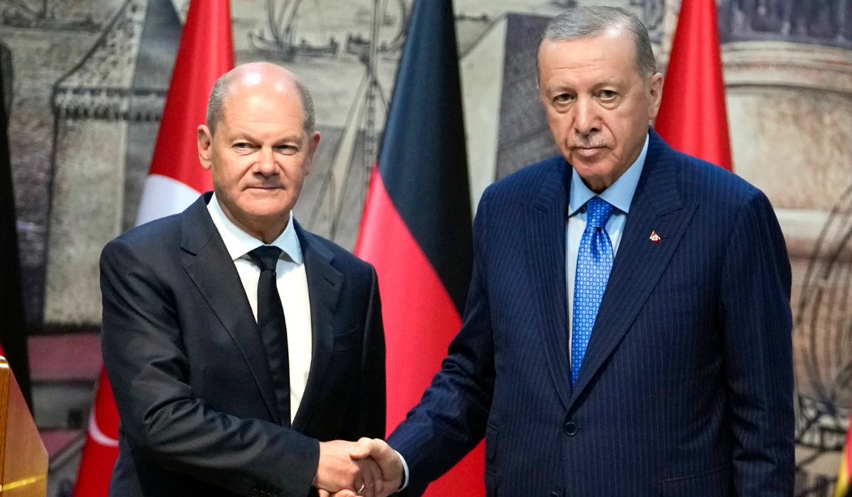 Turkey's President Recep Tayyip Erdogan, right, shakes hands with Germany's Chancellor Olaf Scholz, following a press conference in Istanbul, Turkey, Saturday, Oct. 19, 2024. (AP)