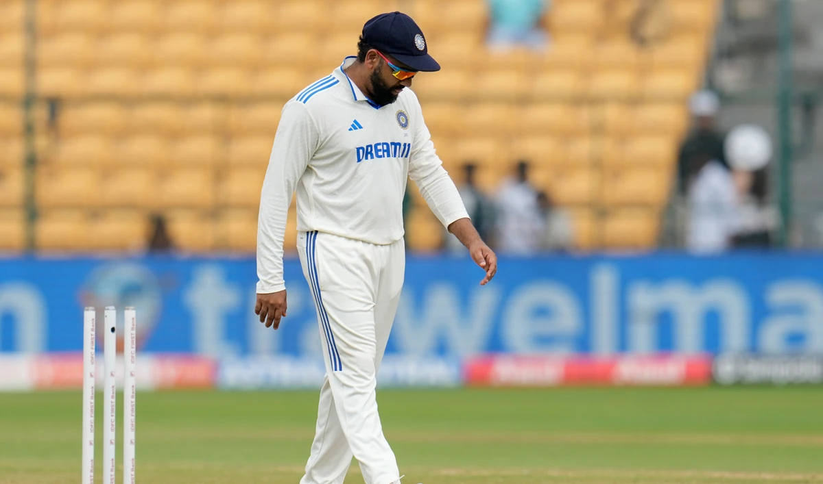 India’s captain Rohit Sharma leaves the field after their loss against New Zealand on the day five of the first cricket test match at the M.Chinnaswamy Stadium, in Bengaluru, on October 20, 2024. (AP)
