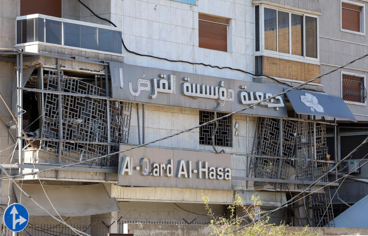 A view shows a damaged building which is a branch of Al-Qard Al-Hassan, a financial institution linked to Hezbollah, in the aftermath of Israeli airstrikes on Sunday, in Beirut suburbs, Lebanon, October 21, 2024. (Reuters)