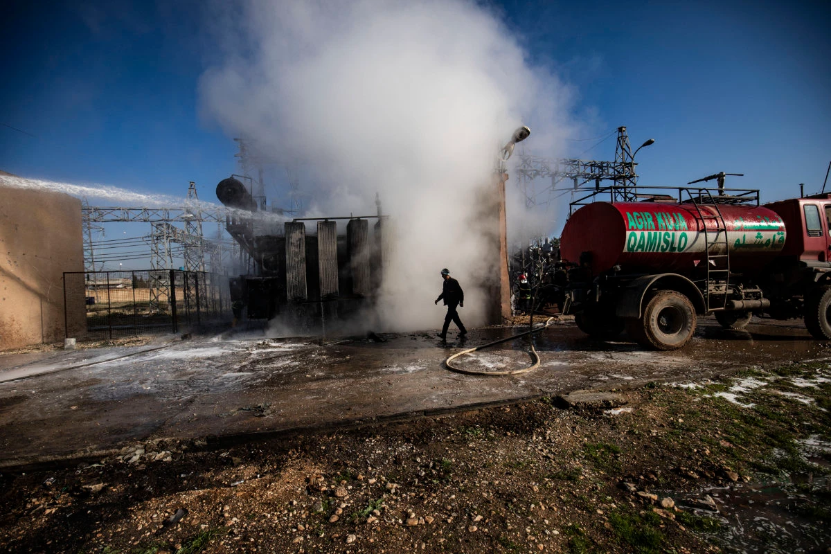 In this photo taken on January 15, 2024, Kurdish Syrian firefighters put out a blaze at a power station in Qamishli that was hit in a series of Turkish airstrikes in northeastern Syria and northern Iraq in response for the deaths of nine Turkish soldiers. On Oct. 23, 2024, Turkiye launched another series of punitive strikes targeting Kurdish militant positions in Syria and Iraq after a terror attack at a defense firm near Ankara, which was blamed on Kurdish militants. (AFP)