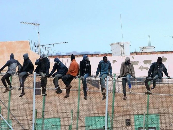 Spanish police on Thursday said they had broken up a network suspected of smuggling at least 70 Syrian and Algerian migrants to Spain and made three arrests. (AFP/File)