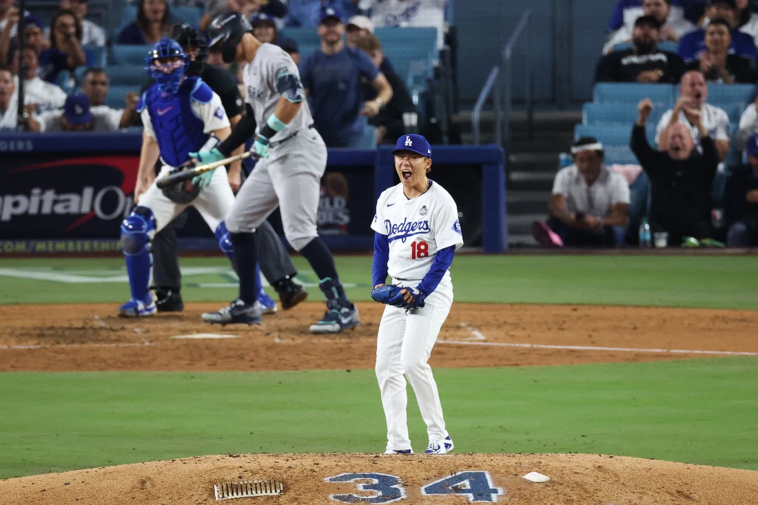 Yoshinobu Yamamoto of the Los Angeles Dodgers reacts after striking out Aaron Judge of the New York Yankees in the sixth inning during Game 2 of the 2024 World Series at Dodger Stadium in Los Angeles, California. (Getty Images/AFP)