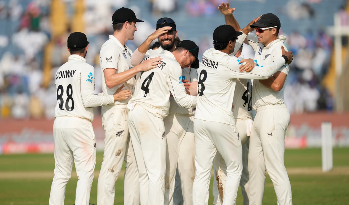 New Zealand’ players celebrate after their win against India on the day three of the second cricket test match at the Maharashtra Cricket Association Stadium in Pune, India on October 26, 2024. (AP)