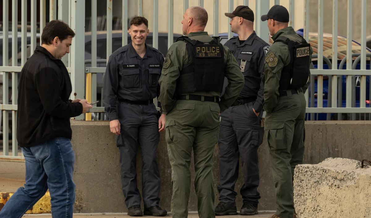 Federal enforcement officers stand outside the Metropolitan Detention Center during an interagency operation, Monday, Oct. 28, 2024, in the Brooklyn Borough of New York. (AP)
