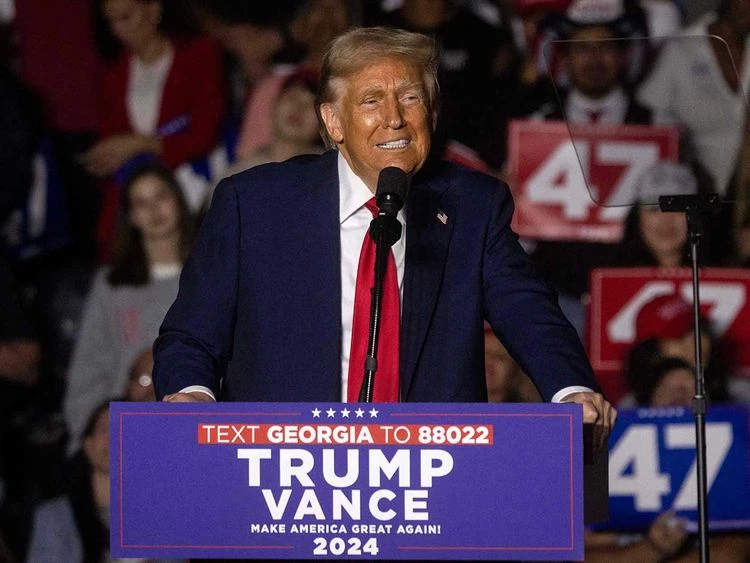 Former US President and Republican presidential candidate Donald Trump speaks during a campaign rally at the McCamish Pavilion in Atlanta, Georgia. (AFP)
