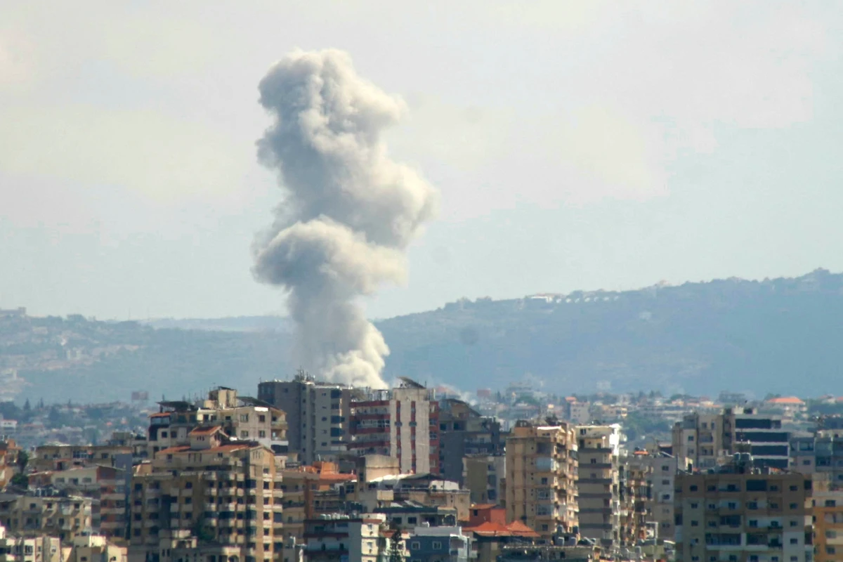 Smoke rises from the site of an Israeli strike targeting the village of Qana, southern Lebanon. October 12, 2024 (File/AFP)