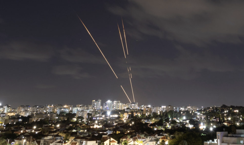 Israel's Iron Dome anti-missile system intercepts rockets from Iran. (Reuters)