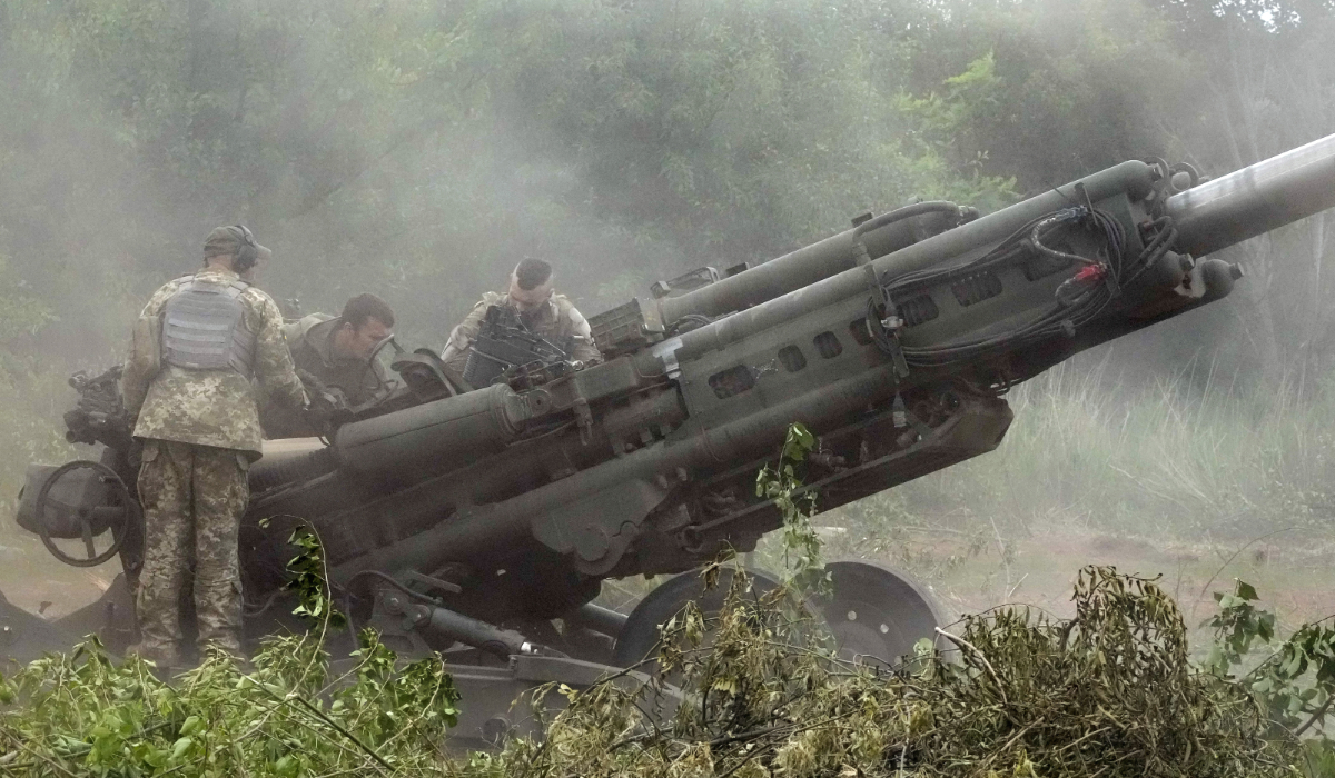 Ukrainian soldiers prepare to fire at Russian positions from a US-supplied M777 howitzer in Ukraine's Donetsk region. (AP)