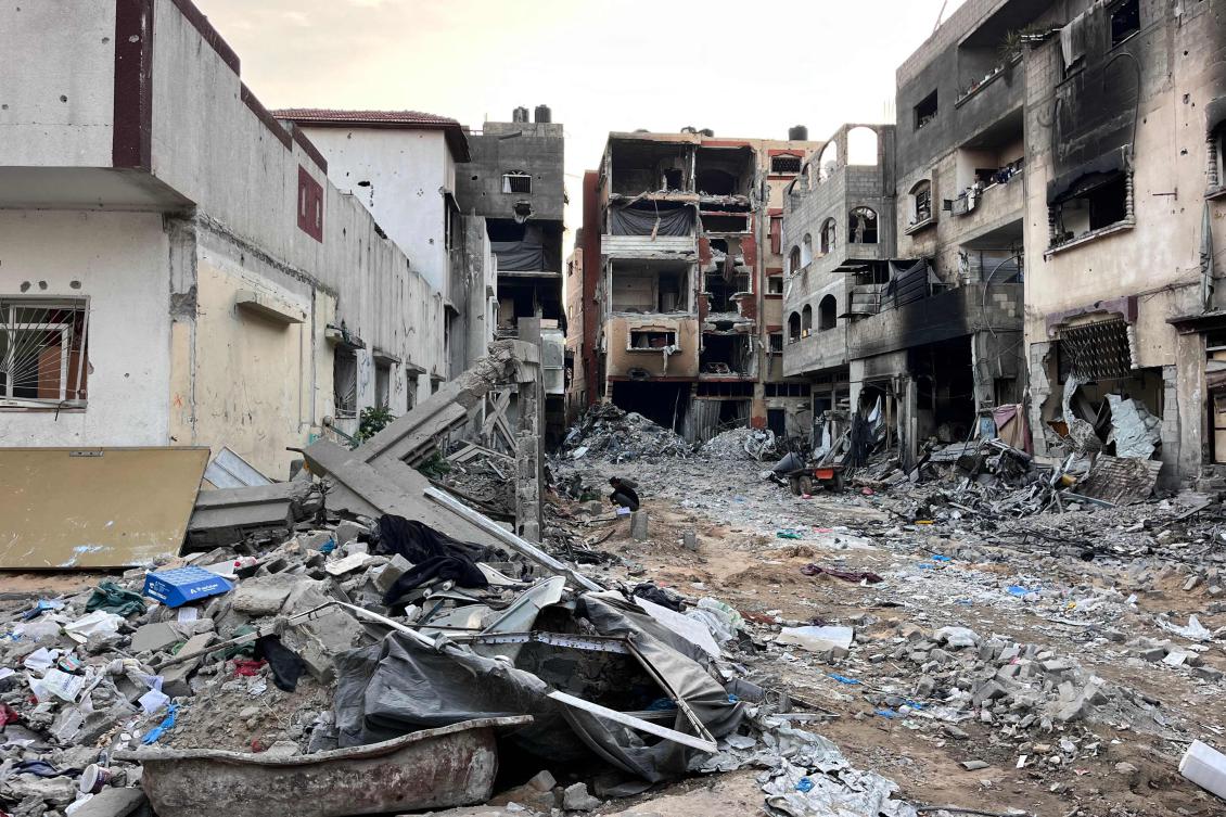 Rubbish and debris are scattered near damaged buildings in the vicinity of the Kamal Adwan hospital in Beit Lahya in the northern Gaza Strip on October 31, 2024, amid the ongoing war between Israel and the Palestinian Hamas movement. (AFP)