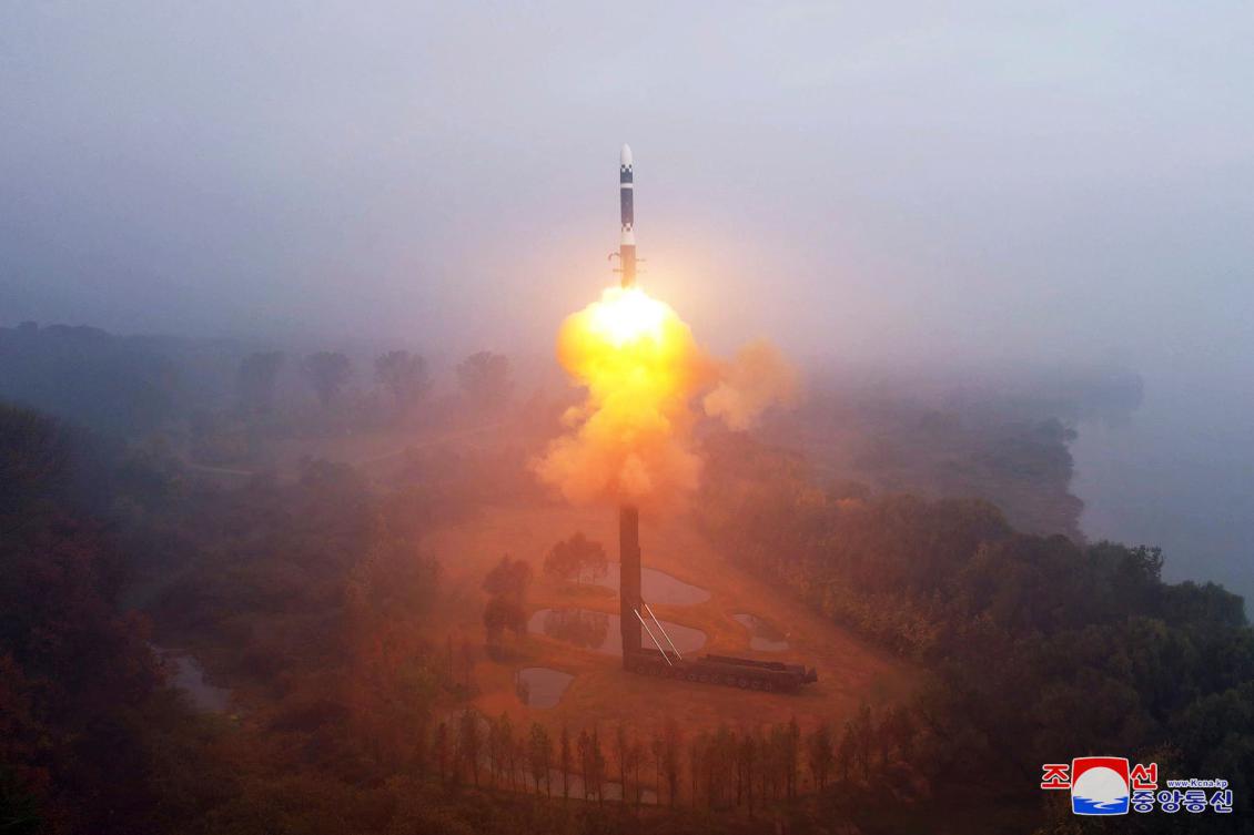 Above, the test-firing of the new Hwasong-19 intercontinental ballistic missile at an undisclosed location in North Korea in this photo released Nov. 1, 2024. (KCNA via KNS/AFP)