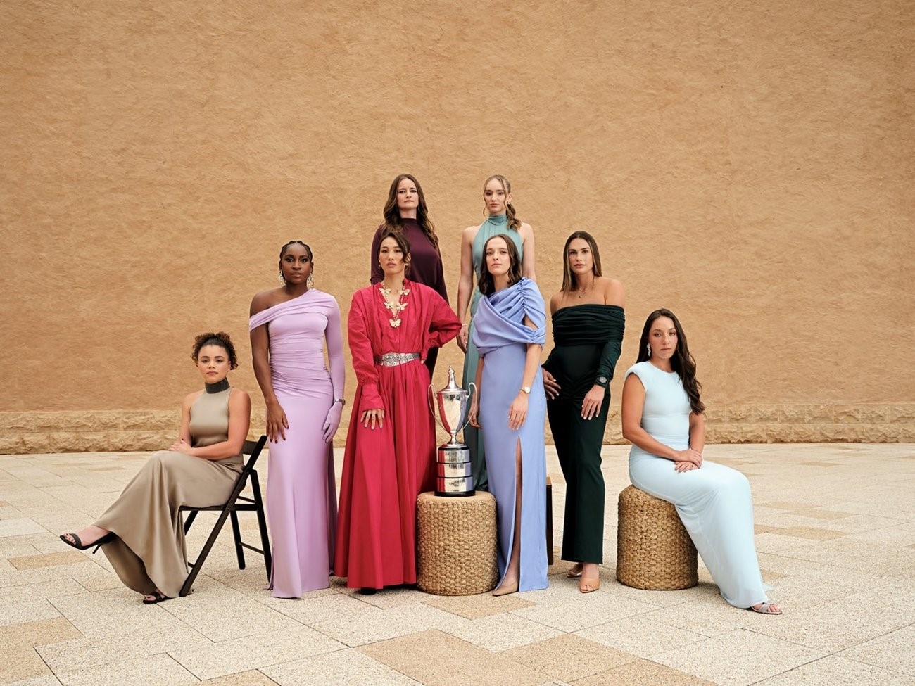 The world's best eight singles players pose with the WTA Finals Billie Jean King Trophy in the historic district of Diriyah. (WTA)