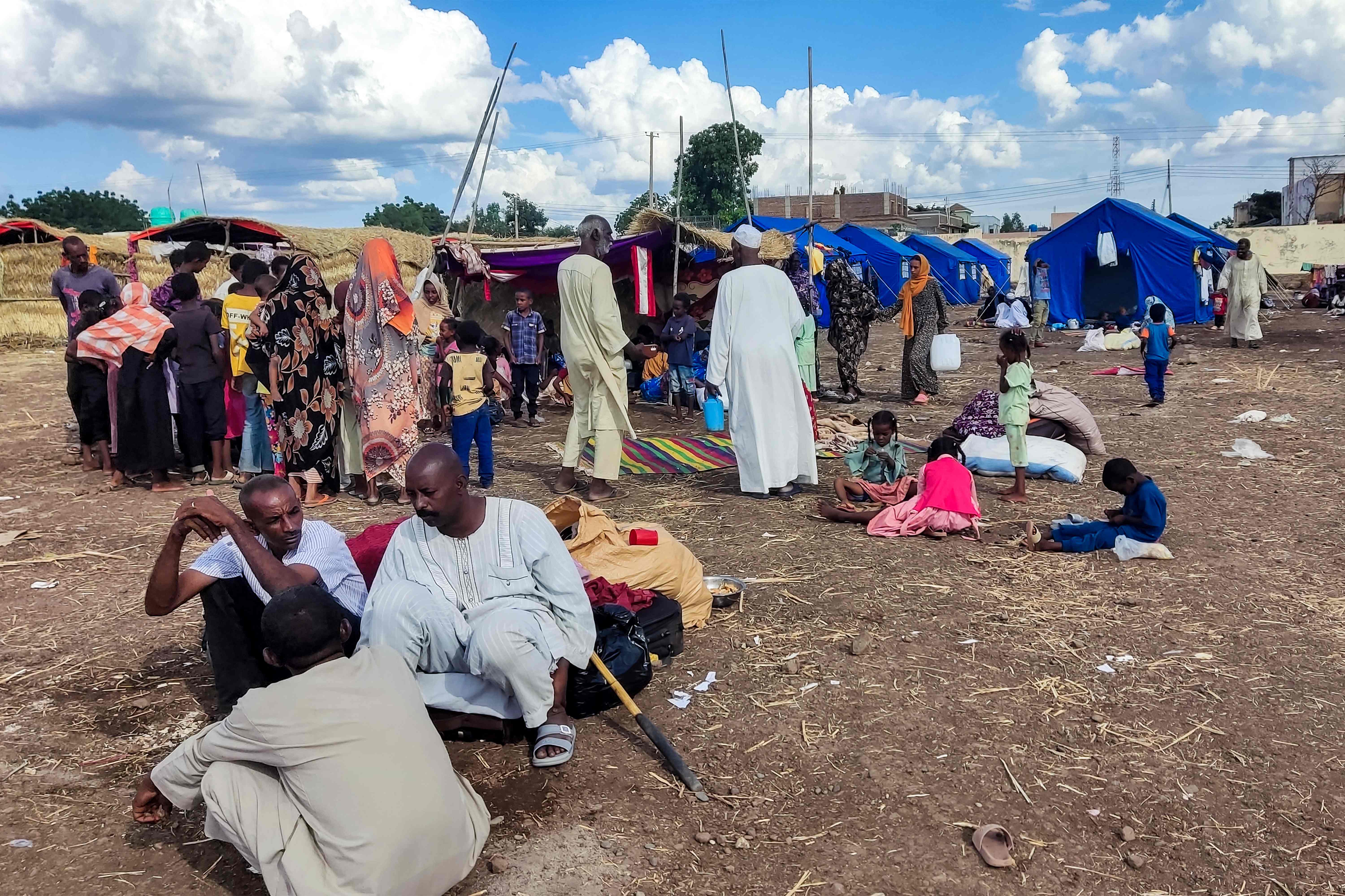Sudanese people fleeing the Jazirah district arrive at a camp for the displaced in the eastern city of Gedaref on Oct. 31, 2024. (AFP)