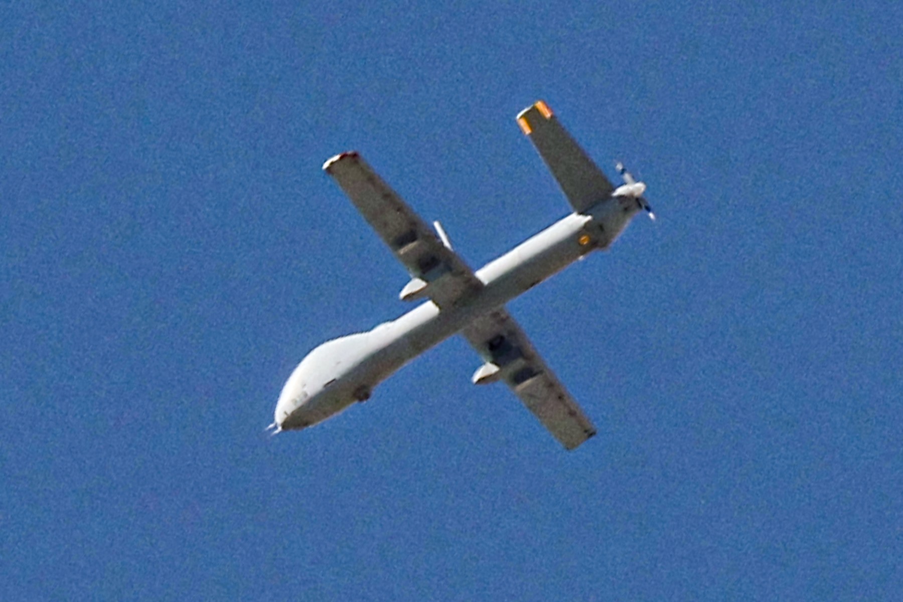 File photo This picture taken from Israel's southern border with the Gaza Strip shows an Israeli unmanned aerial vehicle (UAV or done) flying over the Palestinian territory on March 13, 2024 (AFP)