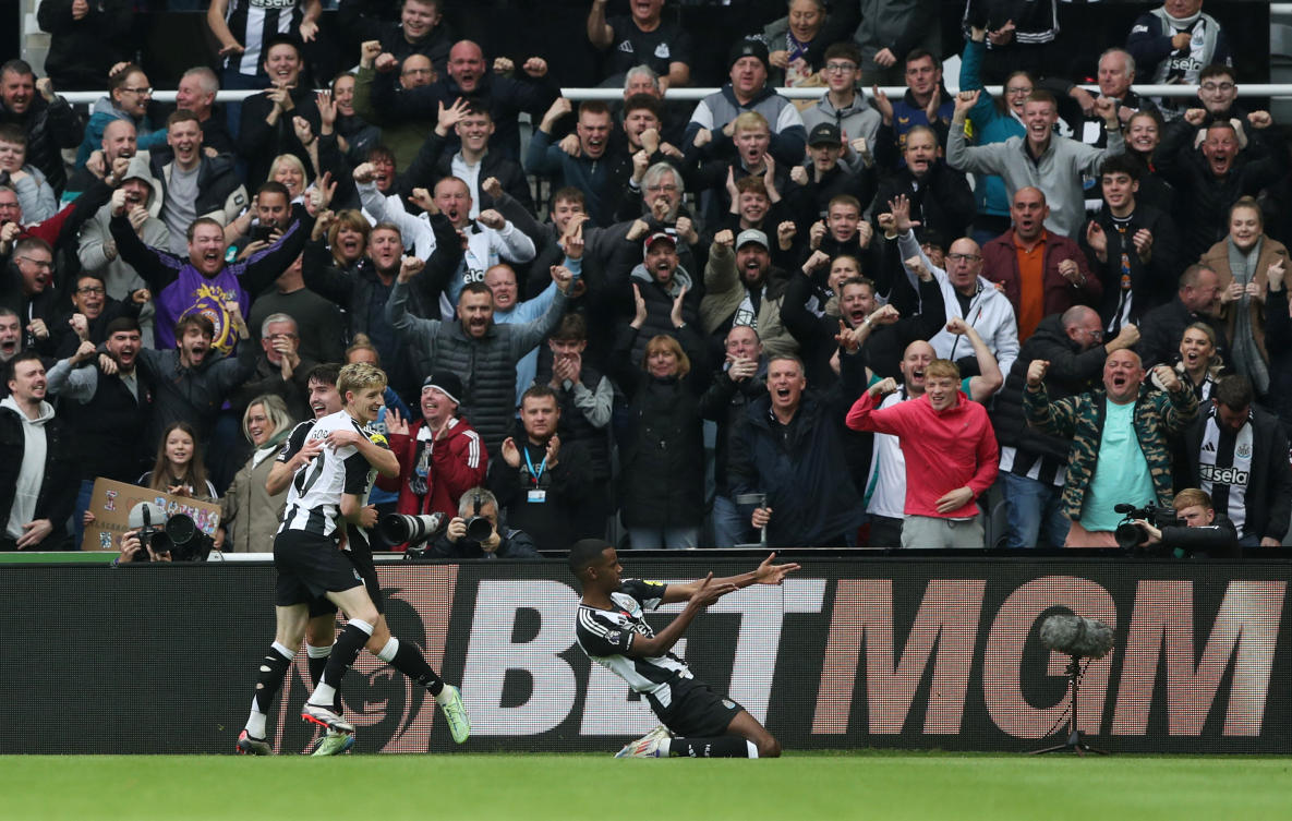 Newcastle United’s Alexander Isak celebrates scoring their first goal with Anthony Gordon and Tino Livramento. (Reuters)