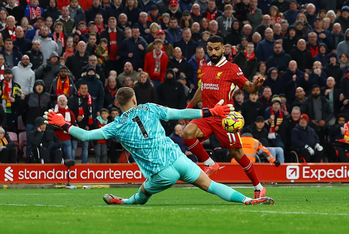 Liverpool’s Mohamed Salah in action against Brighton & Hove Albion’s Bart Verbruggen. (Reuters)