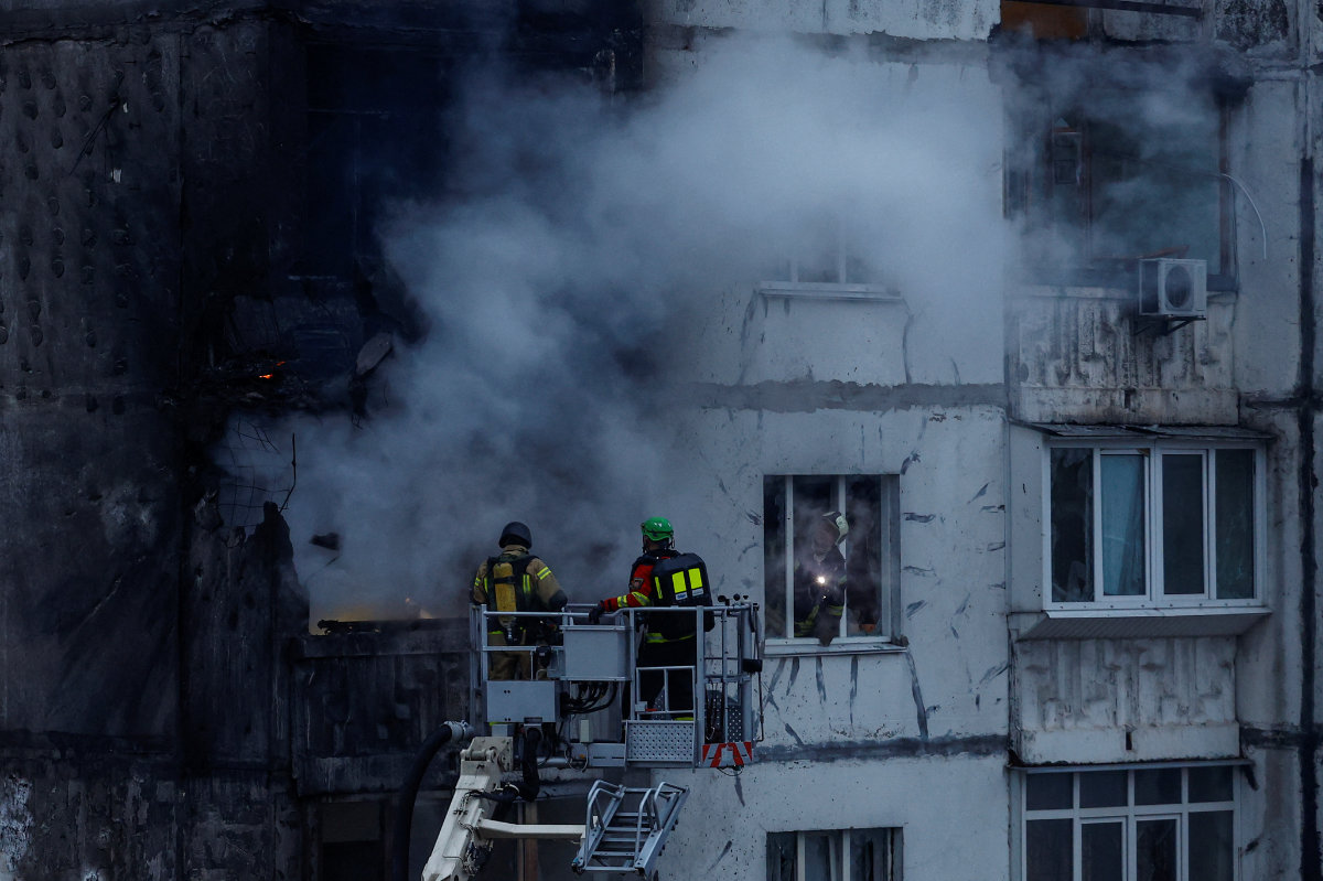 Firefighters work at an apartment building damaged by a Russian drone strike in Kyiv, Ukraine, on November 2, 2024. (REUTERS)