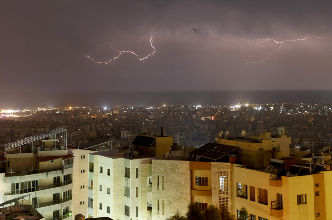 A lightning flash gleams over Beirut's southern suburbs, amid the ongoing hostilities between Hezbollah and Israeli forces, as seen from Baabda, Lebanon, November 2, 2024. (Reuters)
