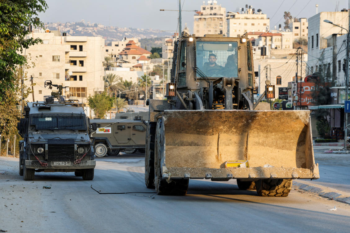 Israeli military vehicles operate during an Israeli raid in Tulkarm, in the Israeli-occupied West Bank, October 31, 2024. (Reuters)