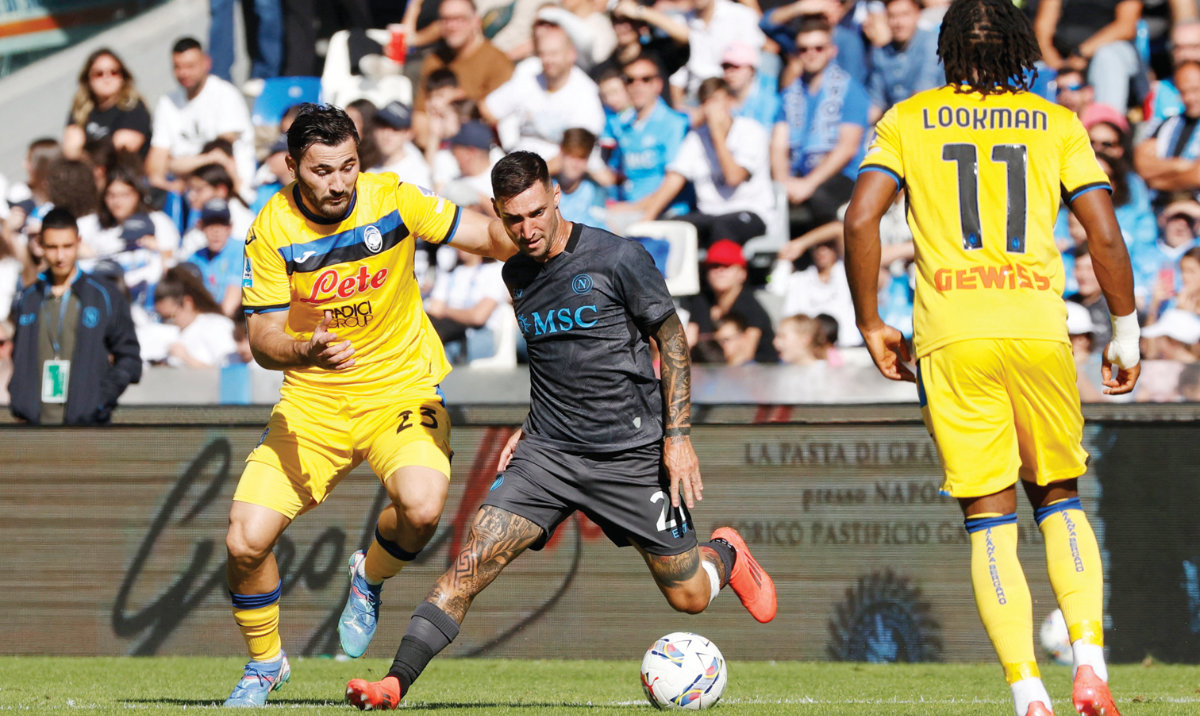 Napoli’s Matteo Politano and Atalanta’s Sead Kolasinac in action. (Reuters)