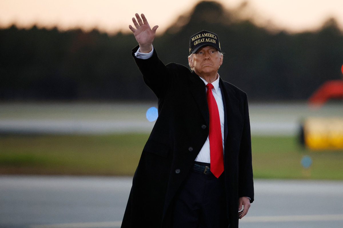 Republican presidential nominee Donald Trump waves to supporters at the conclusion of a campaign rally at Kinston Regional Jetport in Kinston, North Carolina, on Nov. 3, 2024. (Getty Images/AFP)