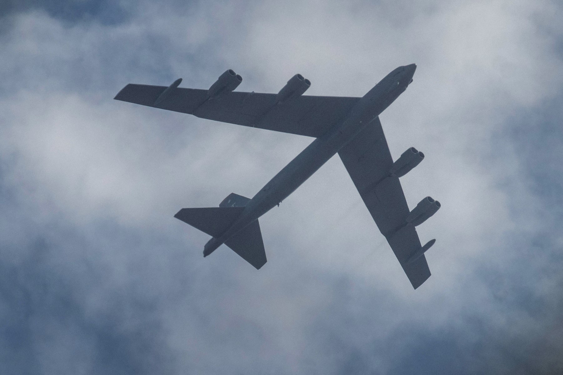 A US Air Force's B-52 bomber flies over Skopje, on August 22, 2022 (AFP)