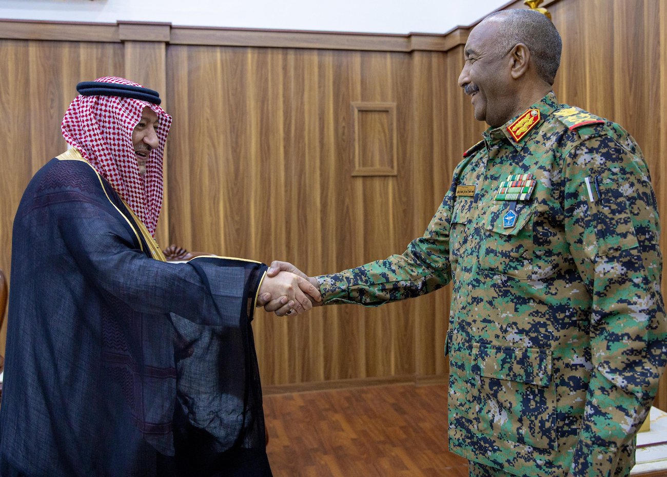 Sudan’s army chief Abdel Fattah Al-Burhan receives Saudi Arabia’s Deputy Foreign Minister Waleed Al-Khuraiji in Port Sudan on Tuesday. (SPA)