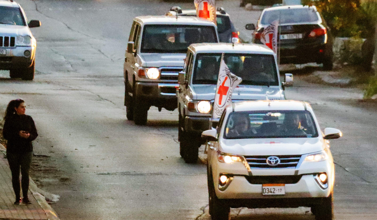 A convoy of Red Cross ambulances drive in the Marjayoun area in southern Lebanon, near the border with Israel, after being granted permission by Israeli forces to retrieve the bodies of people killed during Israeli air strikes on the village of Khiam on November 5, 2024, amid the ongoing war between Israel and Hezbollah. (AFP)