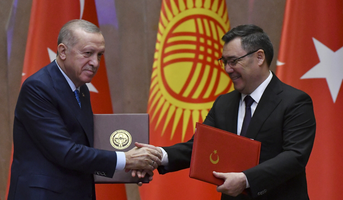 Turkish President Recep Tayyip Erdogan, left, and Kyrgyz President Sadyr Japarov, right, shake hands during a signing ceremony at Ala Archa State Residence in Bishkek, Kyrgyzstan, Tuesday, Nov. 5, 2024. (AP)